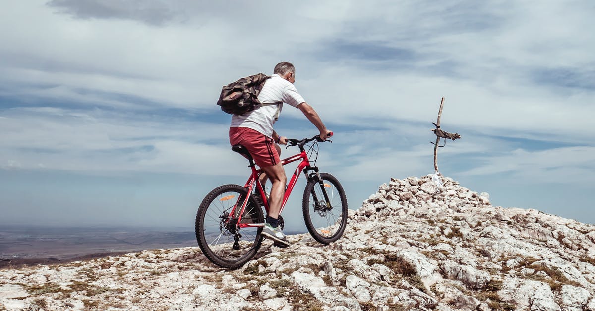 Backpacking in Pärnu in the summer - Man Riding Bicycle on Off-road Backpacking in Pärnu in the summer - Man Riding Bicycle on Off-road