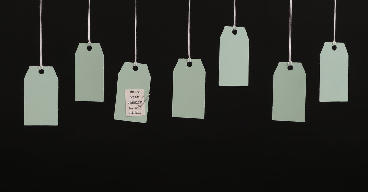 Baggage tagged with "limited release" - Blank Hang Tags with a Black Background Baggage tagged with "limited release" - Blank Hang Tags with a Black Background