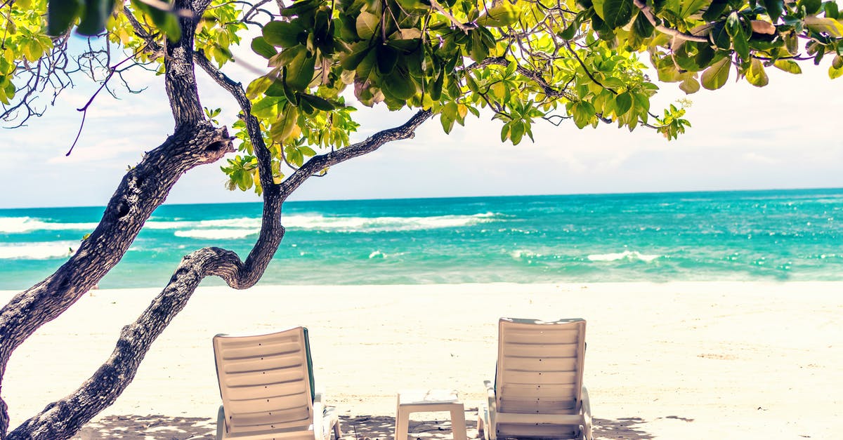 Bahamas Visa Enquiry - Outdoor Loungers On Seashore Bahamas Visa Enquiry - Outdoor Loungers On Seashore