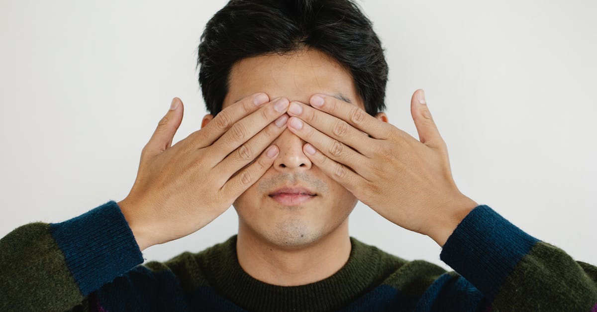 Based on what hidden and/or publicly available criteria are Schengen visas granted? [closed] - Photo of Man Covering his Eyes Using Hands