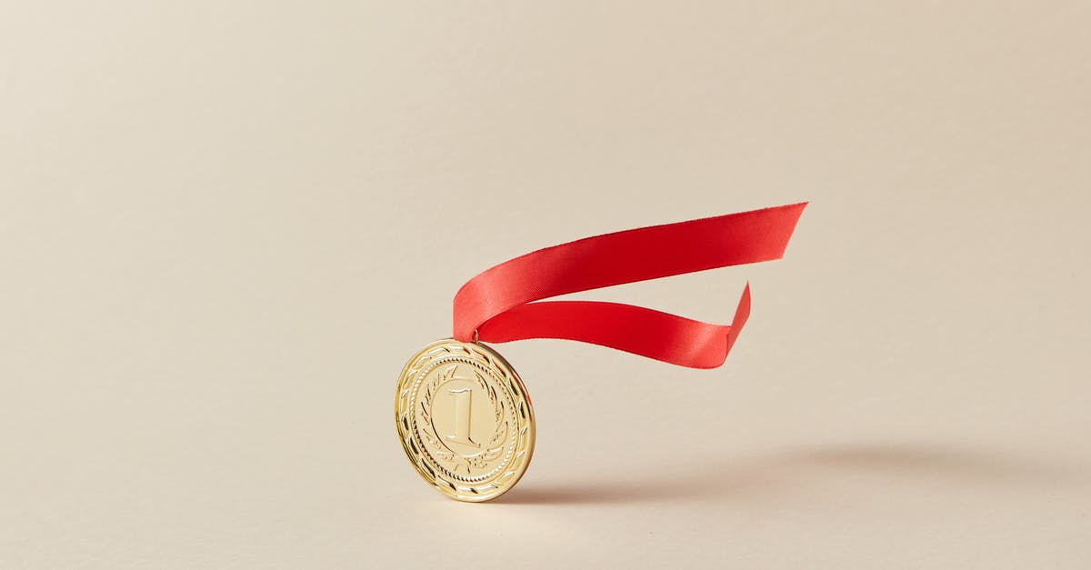 BB in thumb and first flight ahead - Gold and Red Round Coin BB in thumb and first flight ahead - Gold and Red Round Coin