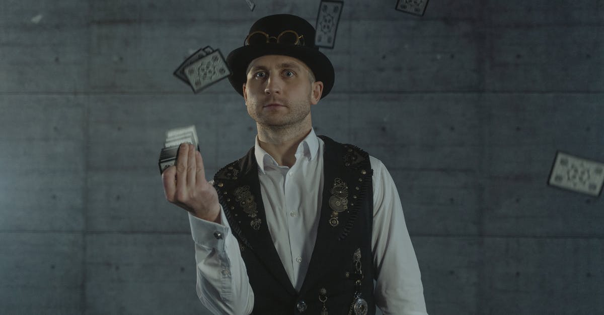 Benefit cards combination for Berlin - Man in White Dress Shirt and Black Vest Holding White Ceramic Mug Benefit cards combination for Berlin - Man in White Dress Shirt and Black Vest Holding White Ceramic Mug