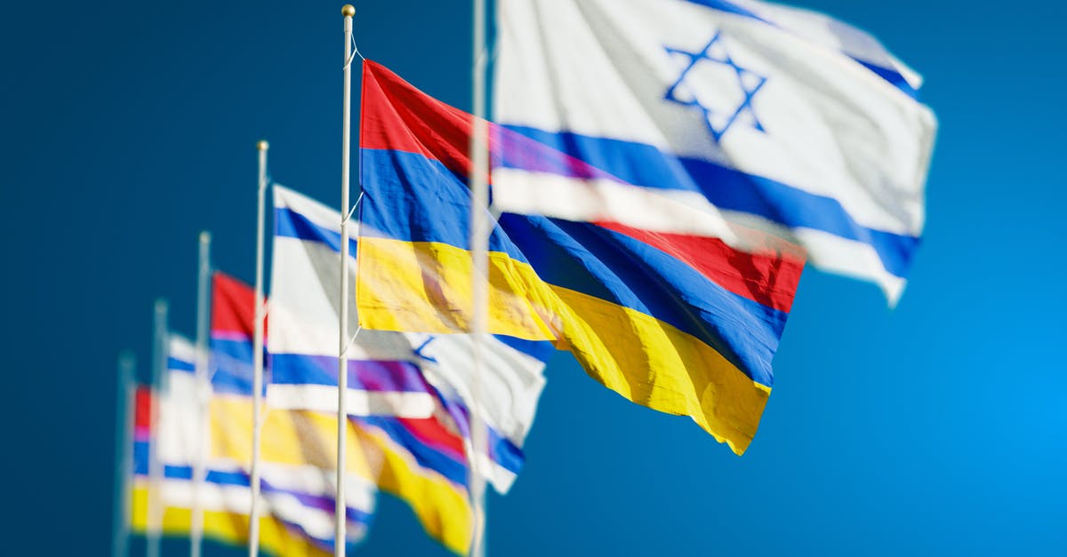 Besides Arab/Muslim countries re Israel, are there other countries which don't recognize passports of any other countries? - Armenia and Israel Flags against Blue Sky