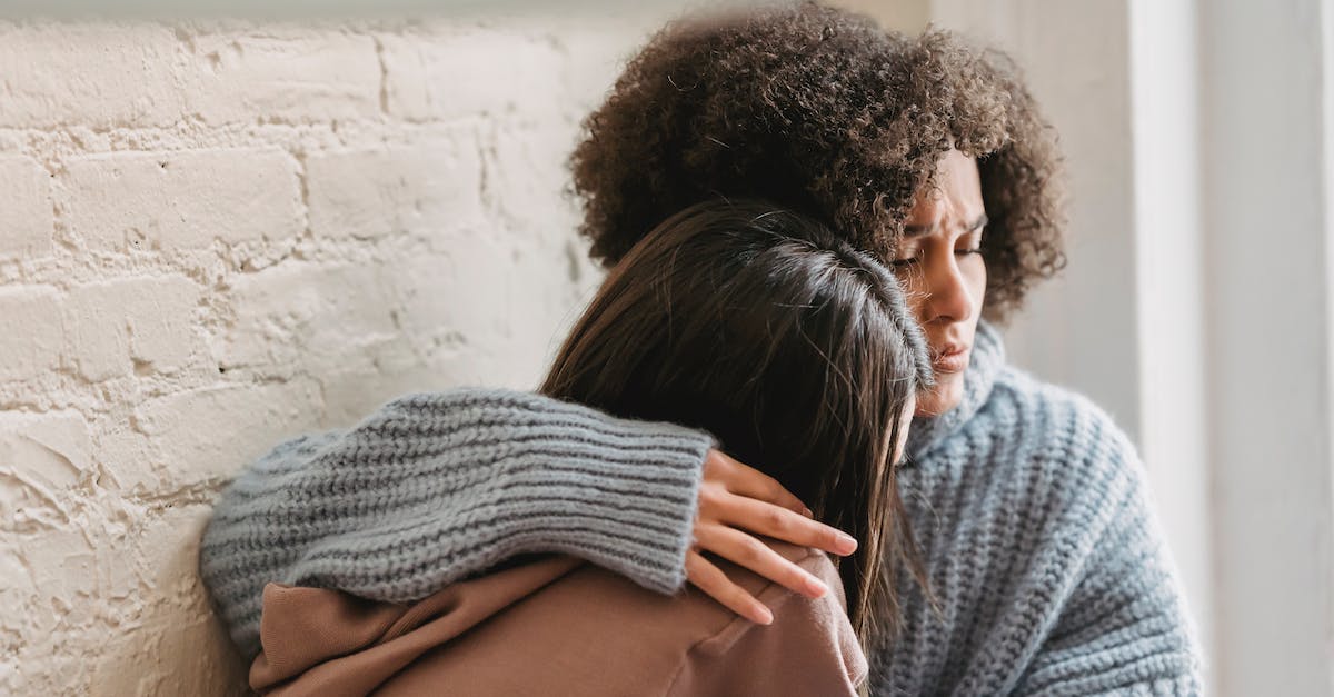 Best inside tip for Liechtenstein? - Sad women hugging at home Best inside tip for Liechtenstein? - Sad women hugging at home