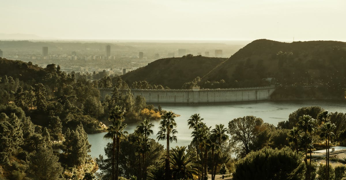 Best source to keep track of US floods? - Amazing scenery of Hollywood Reservoir and dam amidst green verdant trees and hills in California on sunny day Best source to keep track of US floods? - Amazing scenery of Hollywood Reservoir and dam amidst green verdant trees and hills in California on sunny day
