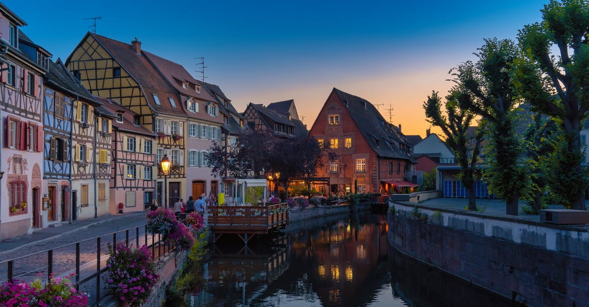 Best way for an American to meet people in France to travel with [closed] - Canal Beside Houses