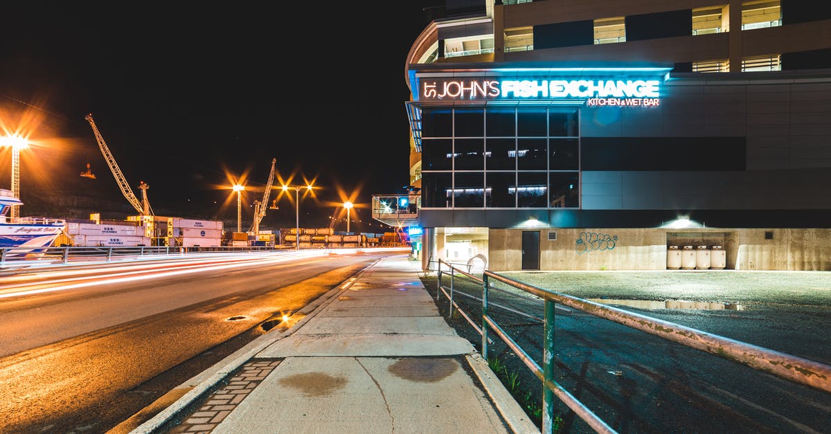 Best way to obtain a Schengen visa for Ukrainian citizen in Canada - Contemporary building on illuminated city street near port at night Best way to obtain a Schengen visa for Ukrainian citizen in Canada - Contemporary building on illuminated city street near port at night