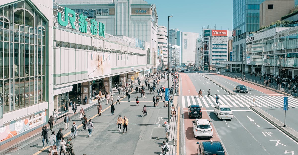 Best way to travel from Palenque to Mexico city by road - From above of unrecognizable people walking near road and modern Shinjuku Station located against cloudless blue sky in Tokyo Best way to travel from Palenque to Mexico city by road - From above of unrecognizable people walking near road and modern Shinjuku Station located against cloudless blue sky in Tokyo