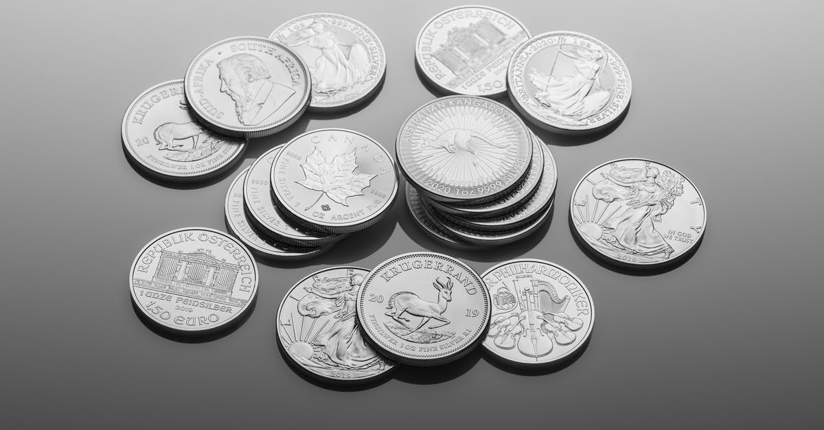 Best ways to transfer Euros from French bank to Indian bank [closed] - Silver Round Coins on Gray Surface