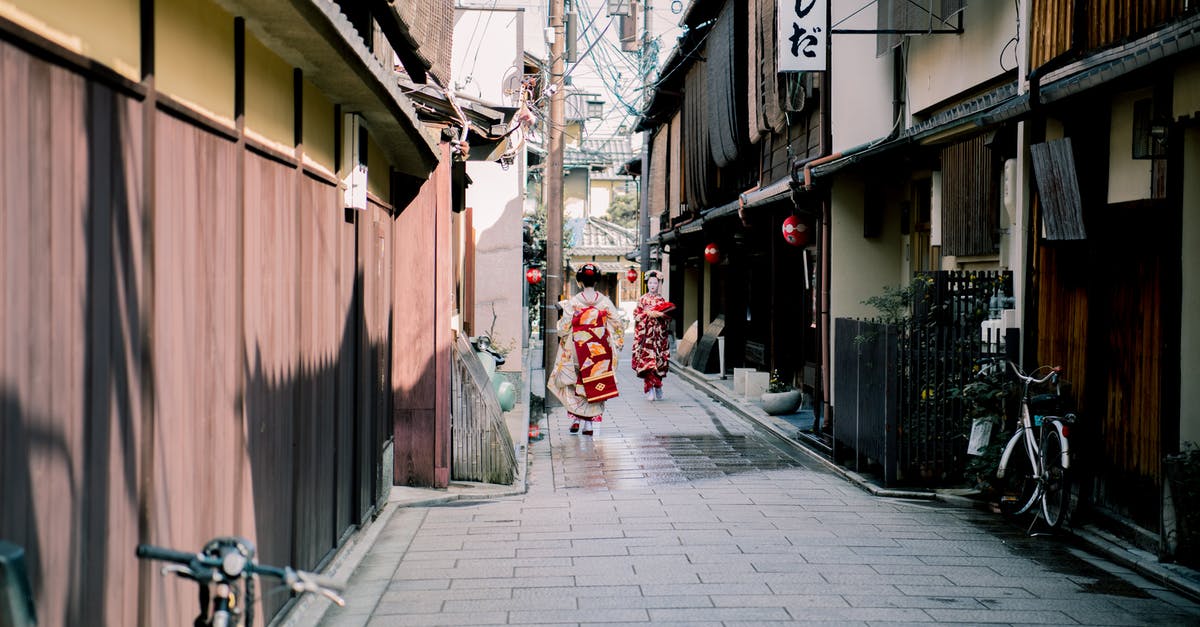 Bike parking in Kyoto - Two Women Wearing Kimono Bike parking in Kyoto - Two Women Wearing Kimono