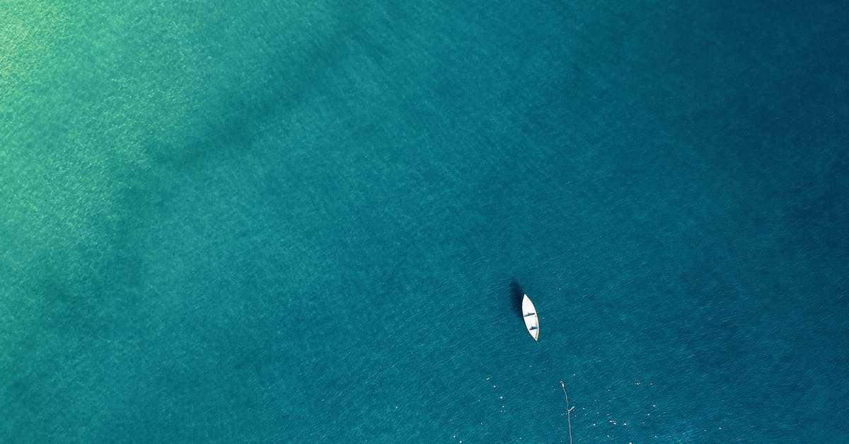 Boat from Phnom Penh to Siem Reap in April - Aerial Photo of Boat on Sea Boat from Phnom Penh to Siem Reap in April - Aerial Photo of Boat on Sea