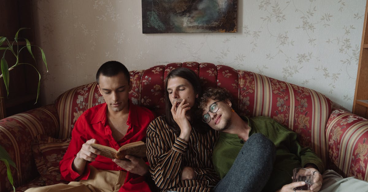 Booking with Third Party Sites - Woman in Black and White Stripe Long Sleeve Shirt Sitting Beside Woman in Red Long Sleeve Booking with Third Party Sites - Woman in Black and White Stripe Long Sleeve Shirt Sitting Beside Woman in Red Long Sleeve