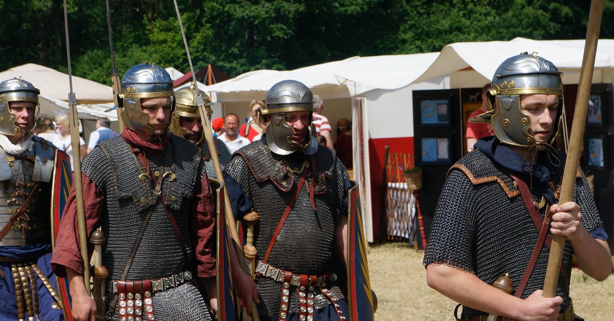 Border control missmarked my passport so it looks like I overstayed a day - Military historical reconstruction male group in metal helmets and weapons in sunny warm day