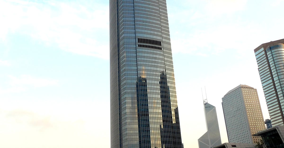 border formalities when entering China from Hong Kong by train - Modern architecture of Hong Kong with various skyscrapers at sunset border formalities when entering China from Hong Kong by train - Modern architecture of Hong Kong with various skyscrapers at sunset