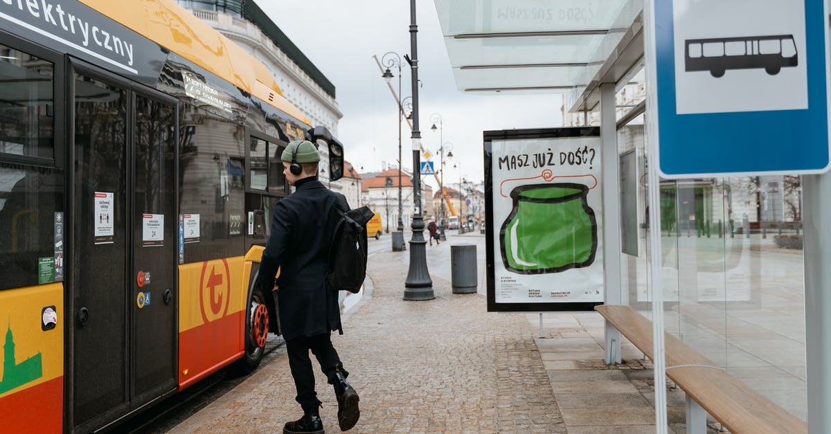 Boston to Europe and back, mixed fare? - Man in Black Balzer Walking Towards the Bus Boston to Europe and back, mixed fare? - Man in Black Balzer Walking Towards the Bus