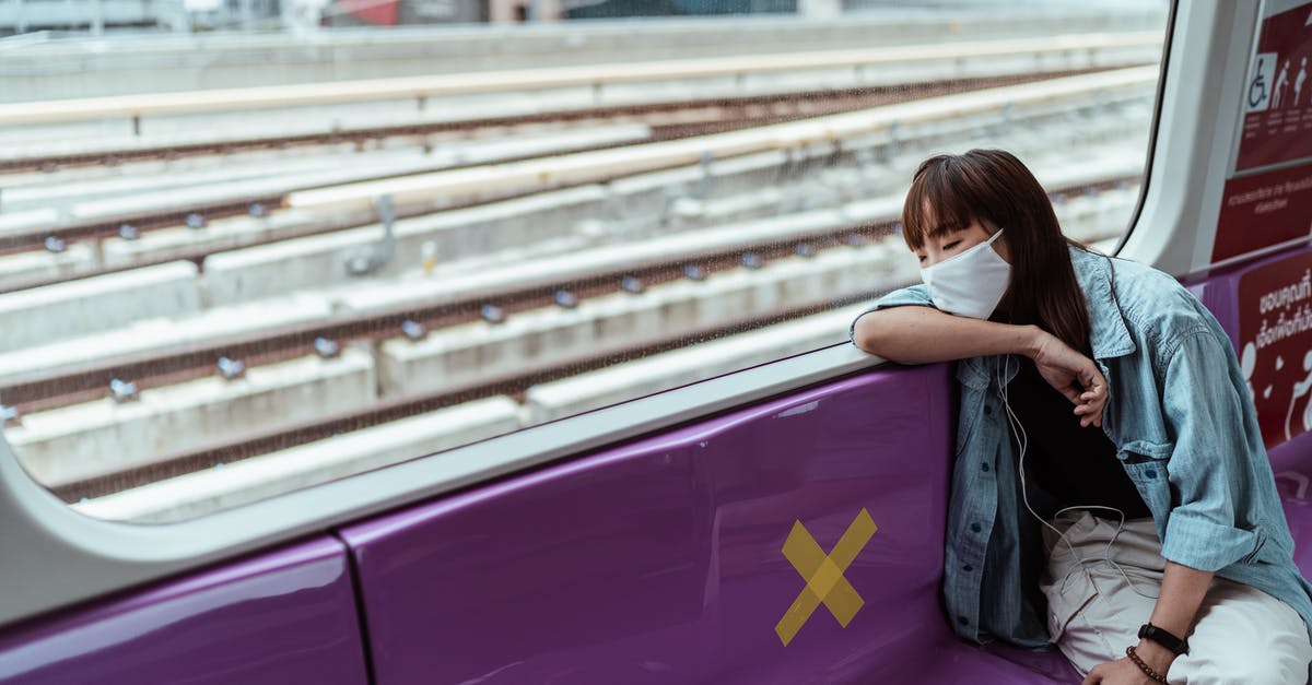 Bought 2 Lufthansa tickets - one person can't travel - free seat next to me? - Woman Wearing a Face Mask on the Subway Bought 2 Lufthansa tickets - one person can't travel - free seat next to me? - Woman Wearing a Face Mask on the Subway