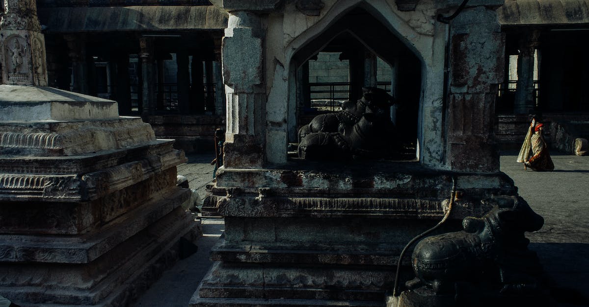 Bouldering guide for Hampi (India) - Weathered oriental stone sculptures statues and buildings located in medieval historic Hampi village in India Bouldering guide for Hampi (India) - Weathered oriental stone sculptures statues and buildings located in medieval historic Hampi village in India