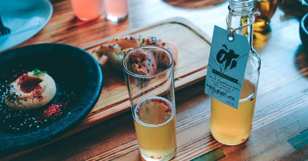 Bread, breakfast bar or canned food are allowed to be brought into australia? [closed] - Clear Glass Bottle and Drinking Glass With Brown Liquid