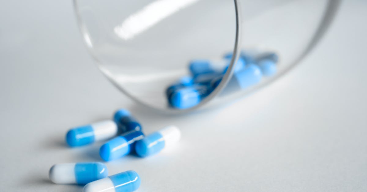 Bringing prescription drugs into Bangkok - Depth Photography of Blue and White Medication Pill Bringing prescription drugs into Bangkok - Depth Photography of Blue and White Medication Pill