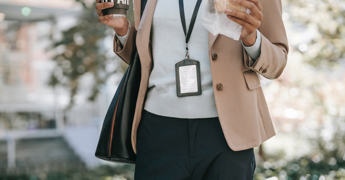 Bringing tea bags in zip lock bag to Korea? - Crop anonymous ethnic female entrepreneur with takeaway hot drink and bread walking to work Bringing tea bags in zip lock bag to Korea? - Crop anonymous ethnic female entrepreneur with takeaway hot drink and bread walking to work