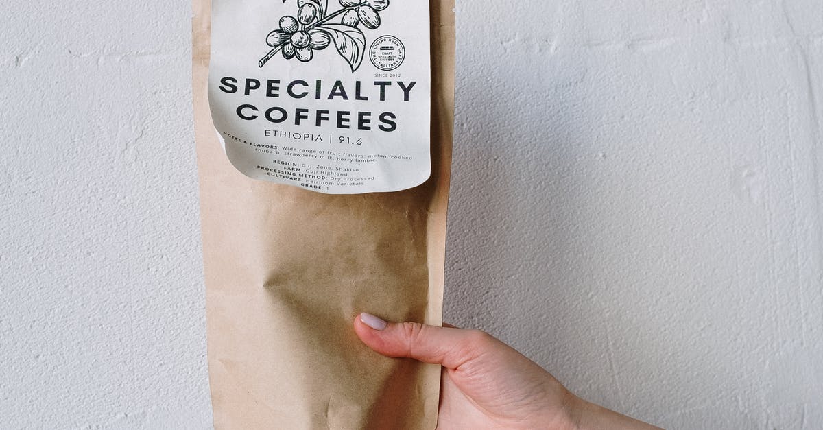 Bringing tea bags in zip lock bag to Korea? - Person Holding Brown and White Paper Bag Bringing tea bags in zip lock bag to Korea? - Person Holding Brown and White Paper Bag