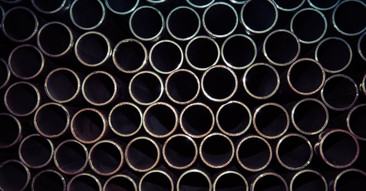 Bringing titanium alloy in luggage? - Close Up Photo of Gray Metal Pipes Bringing titanium alloy in luggage? - Close Up Photo of Gray Metal Pipes