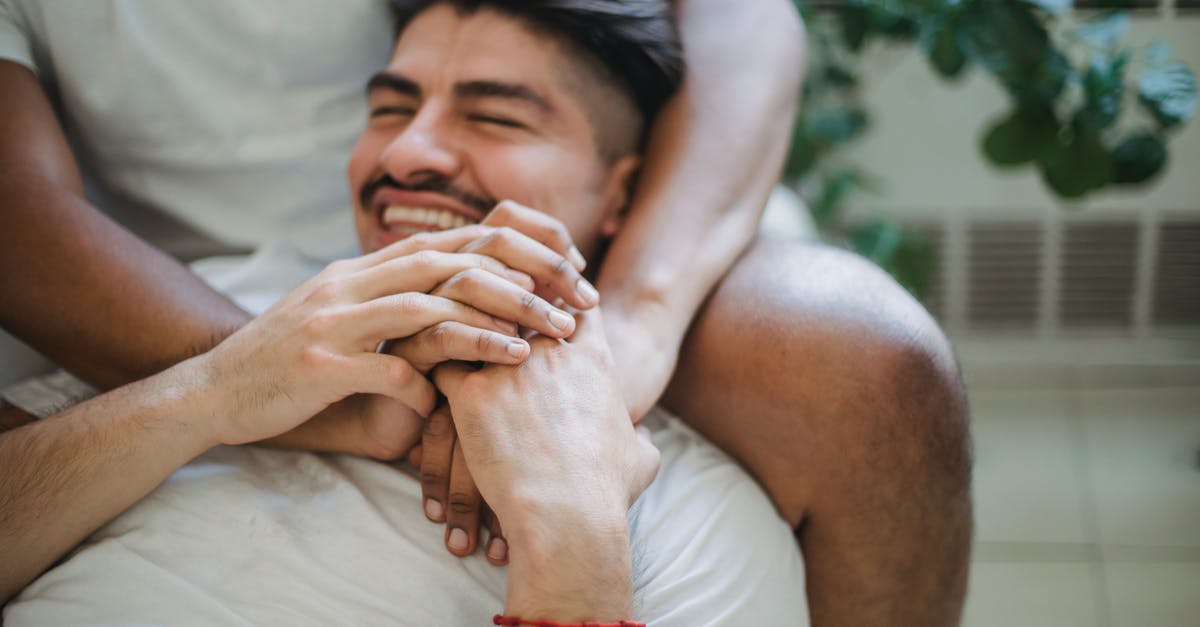 Brussels to Les Arcs for skiing, other than by car? [closed] - Unrecognizable Man Hands Embracing Other Man by Neck