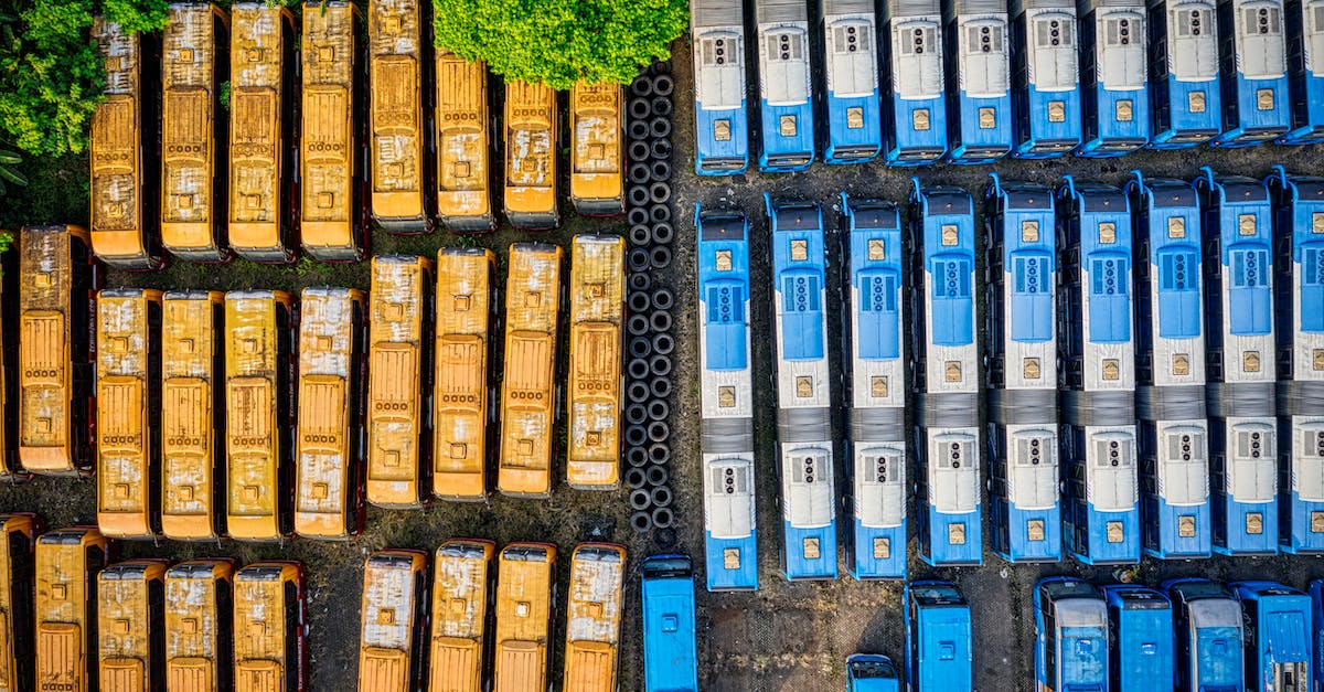 Buses from Jaisalmer to Khuri - Aerial Photography of Buses With Different Colors Buses from Jaisalmer to Khuri - Aerial Photography of Buses With Different Colors