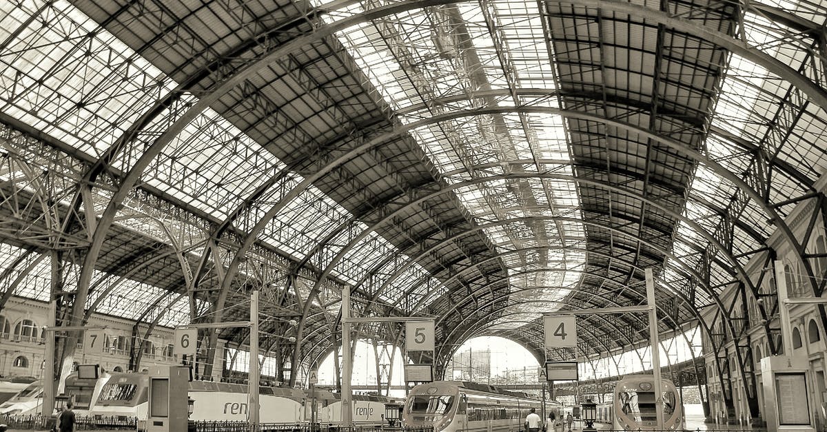 Buying stamps in Barcelona Sants station - View of Railroad Station Buying stamps in Barcelona Sants station - View of Railroad Station