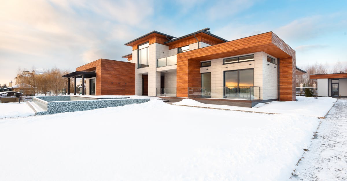Bypass six month passport-validity rule when already in country - New cottage house facade and snowy yard Bypass six month passport-validity rule when already in country - New cottage house facade and snowy yard