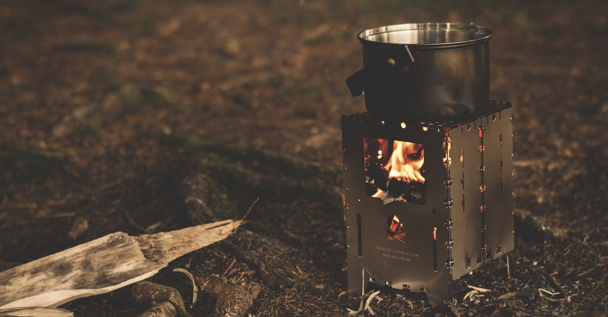 Camping stove on a plane? - Stainless Steel Pot on Brown Wood Stove Outside during Night Time Camping stove on a plane? - Stainless Steel Pot on Brown Wood Stove Outside during Night Time