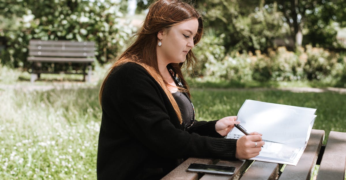 Can a flight refuse to check in bags of correct size if there are too many? - Woman correcting information in paper with pen Can a flight refuse to check in bags of correct size if there are too many? - Woman correcting information in paper with pen