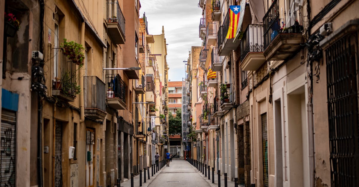 Can a non-EU spouse of EU citizen not resident in EU travel in the EU more than three months? - Gray Concrete Road Between Brown Concrete Buildings Can a non-EU spouse of EU citizen not resident in EU travel in the EU more than three months? - Gray Concrete Road Between Brown Concrete Buildings