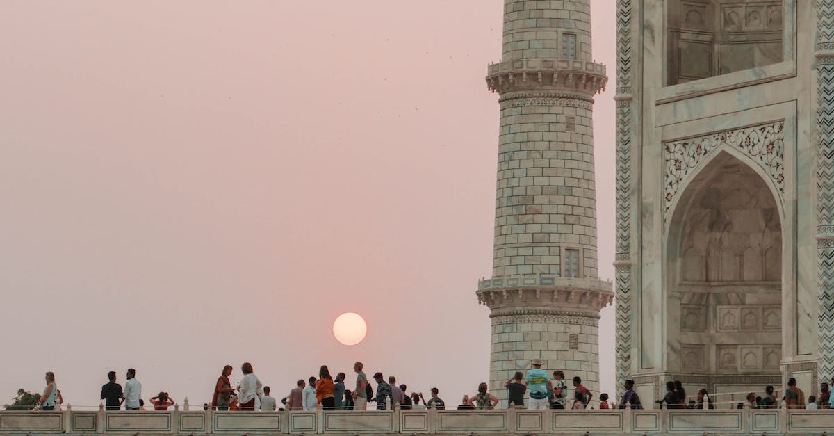 Can a person fly to the Moon as a tourist? - People on Concrete Building during Sunset Can a person fly to the Moon as a tourist? - People on Concrete Building during Sunset