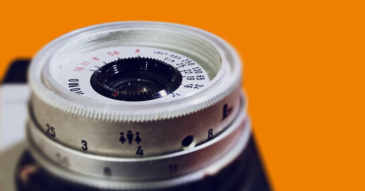 Can a Schengen Visa be refused because the photograph is too old? - Vintage Camera on Orange Surface