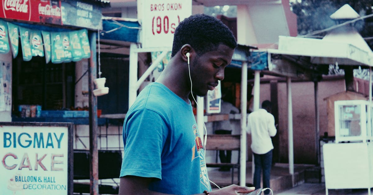 Can a South African apply for a work Z visa in Hong Kong? [closed] - Man Holding Smartphone