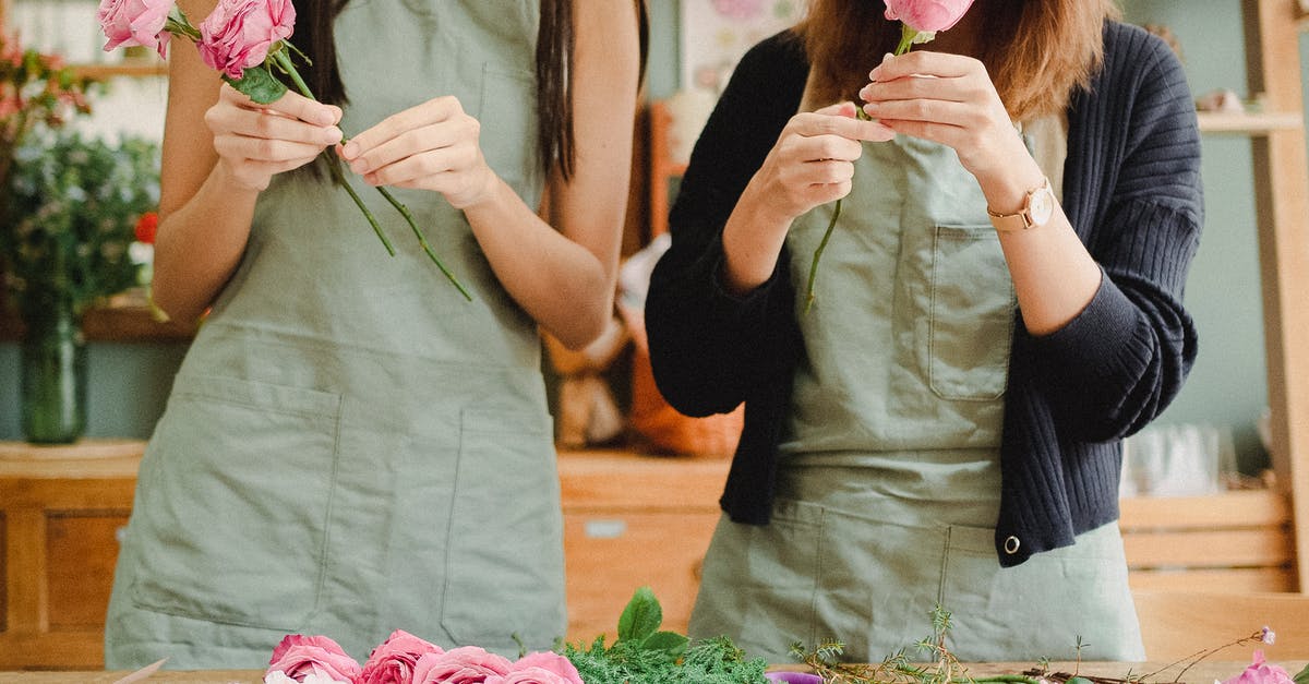 Can a UK national work as a paid shop assistant in the USA? - Female florists arranging bouquet of roses