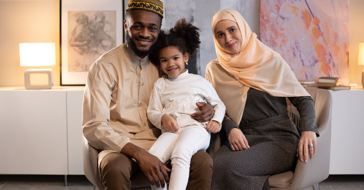 Can American mother living in France bring French father with her to the US right now? [duplicate] - Happy black family in light room