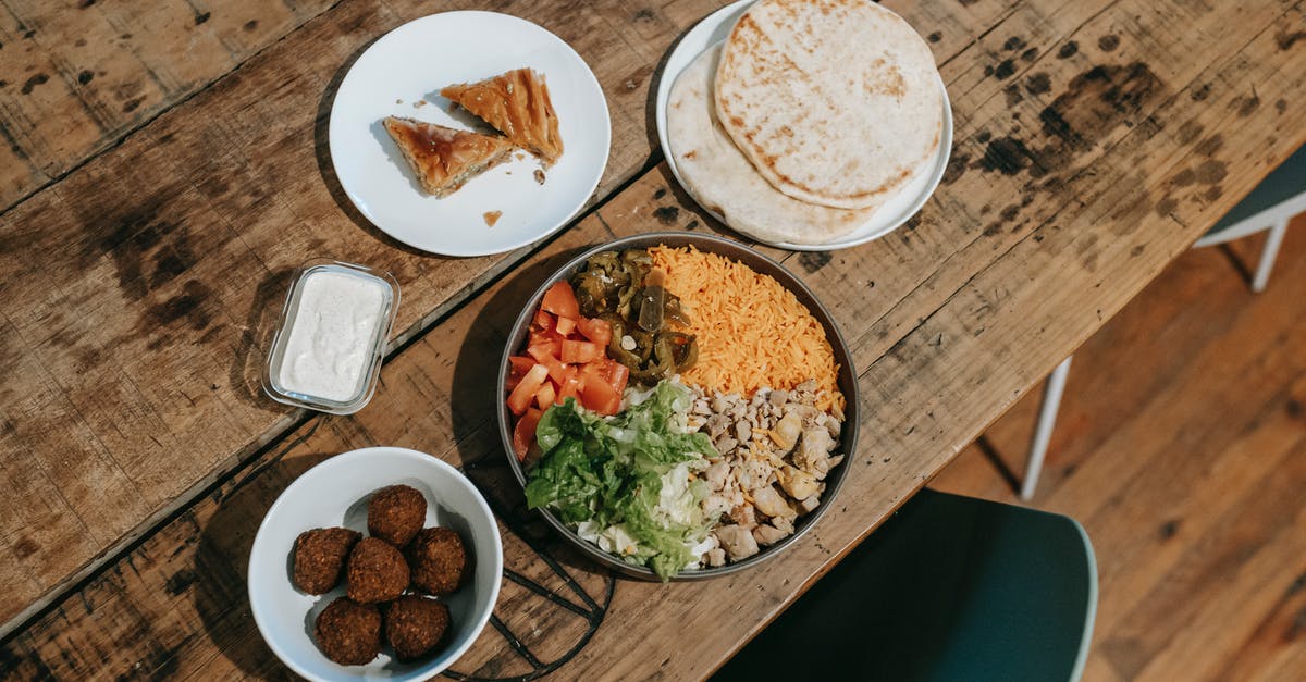 Can food from Indian restaurants in America be found in India? - Various traditional Indian dishes served on table in restaurant Can food from Indian restaurants in America be found in India? - Various traditional Indian dishes served on table in restaurant
