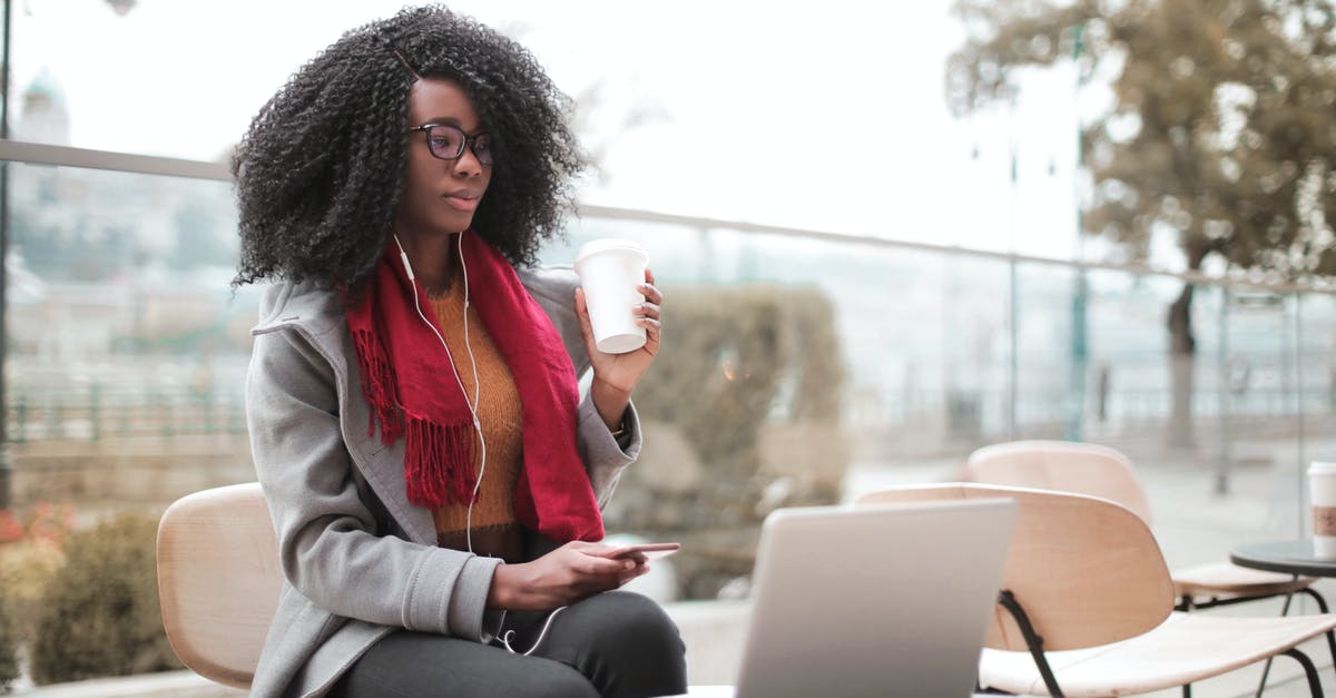 Can I access different business lounges? - Woman Drinking Coffee During Daylight Can I access different business lounges? - Woman Drinking Coffee During Daylight
