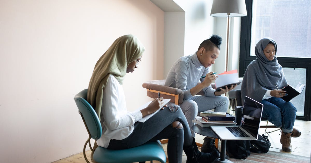 Can I attend a company training on a B1/B2 Visa? - Focused multiethnic students writing in copybooks in coworking space Can I attend a company training on a B1/B2 Visa? - Focused multiethnic students writing in copybooks in coworking space
