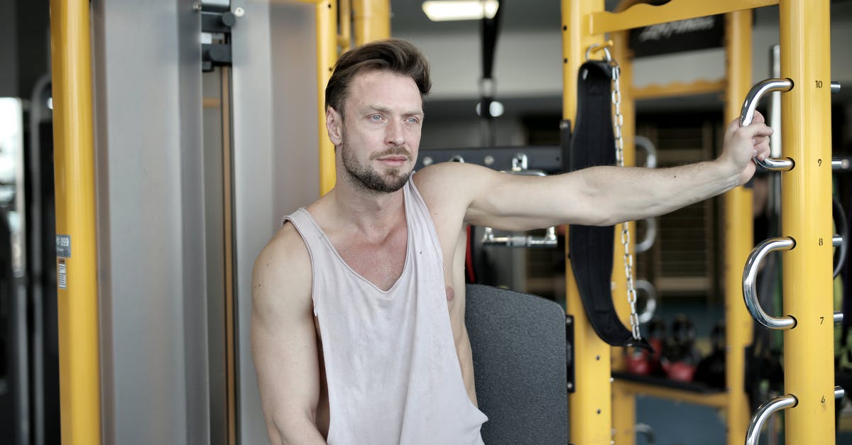 Can I avoid a full body scan going through security with a Nexus card? - Serious bearded male athlete in casual sportswear sitting near modern exercise machine during break in workout in modern fitness center and looking away Can I avoid a full body scan going through security with a Nexus card? - Serious bearded male athlete in casual sportswear sitting near modern exercise machine during break in workout in modern fitness center and looking away