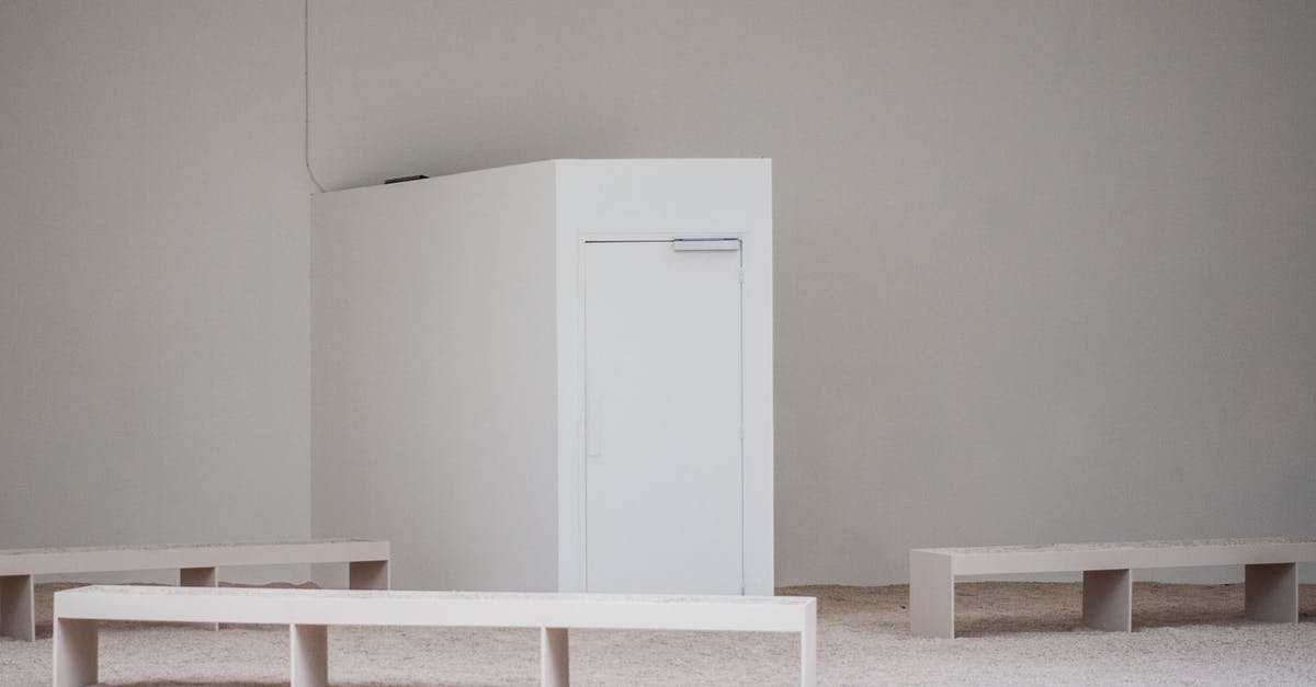 Can I be refused exit due to my place of birth? - White building walls and door near benches on floor in light empty place Can I be refused exit due to my place of birth? - White building walls and door near benches on floor in light empty place