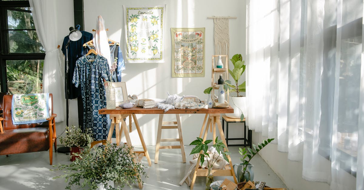 Can I bring a big wooden sword as carry on in a plane? - Interior of atelier with table and clothes on hangers Can I bring a big wooden sword as carry on in a plane? - Interior of atelier with table and clothes on hangers