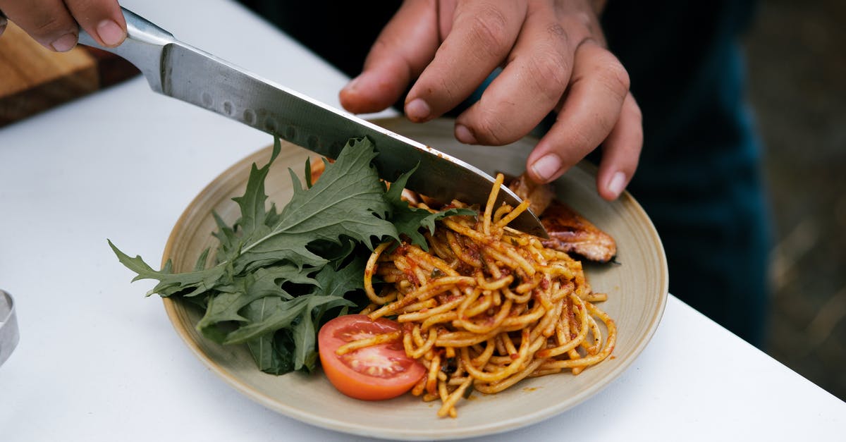 Can I bring a cooking knife to the Maldives? - Person Holding Stainless Steel Knife and Fork Can I bring a cooking knife to the Maldives? - Person Holding Stainless Steel Knife and Fork