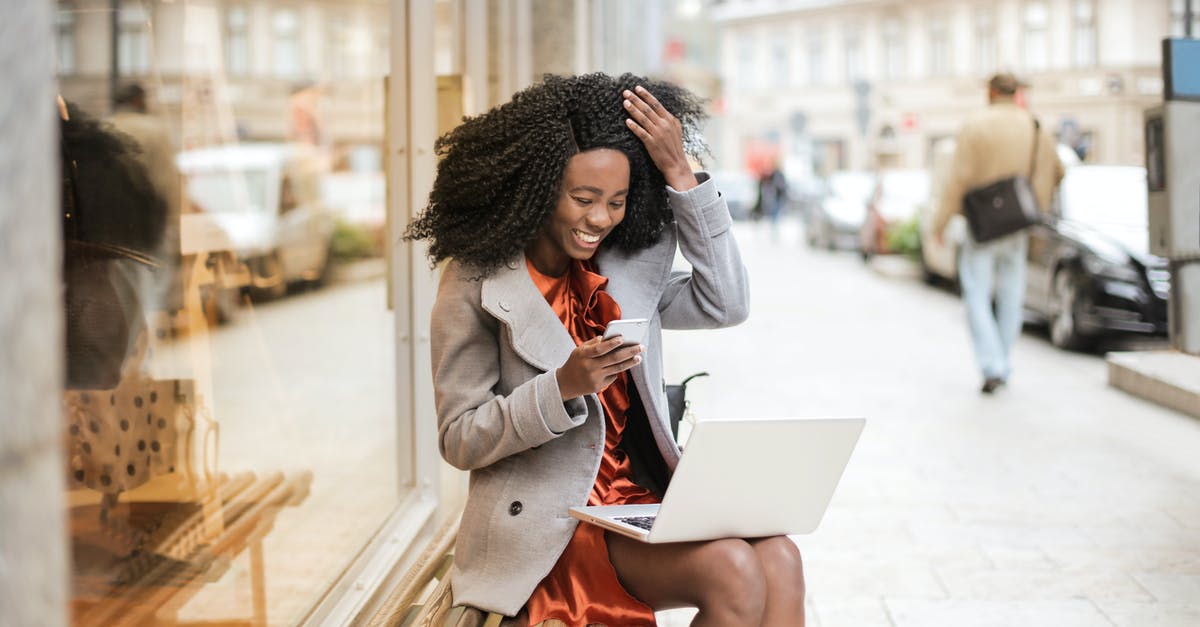 Can I bring a shoebox PC in my carry-on bag? - Woman in Gray Coat Sitting On Wooden bench Can I bring a shoebox PC in my carry-on bag? - Woman in Gray Coat Sitting On Wooden bench