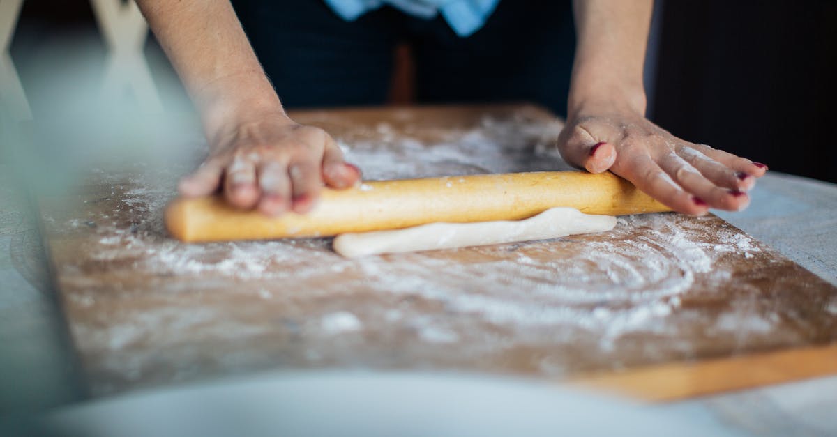 Can I bring a wooden dough rolling stick onto the plane(carry-on)? - Person Holding Brown Wooden Rolling pin Can I bring a wooden dough rolling stick onto the plane(carry-on)? - Person Holding Brown Wooden Rolling pin
