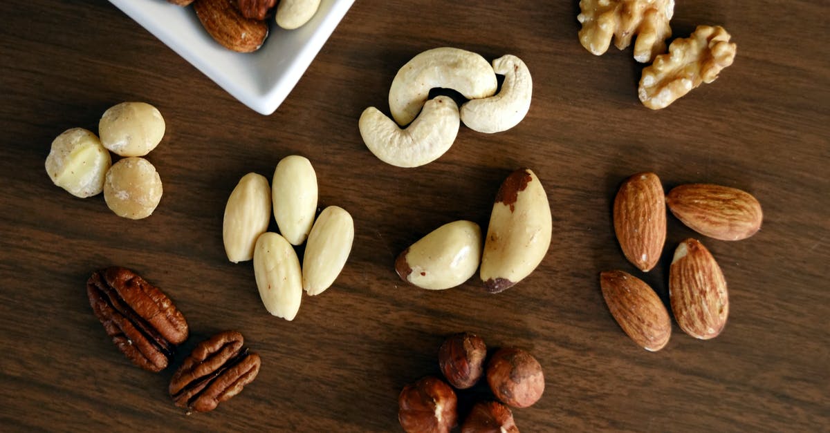 Can I bring nuts and cooked sausage from Brazil to Germany? - Variety of Brown Nuts on Brown Wooden Panel High-angle Photo Can I bring nuts and cooked sausage from Brazil to Germany? - Variety of Brown Nuts on Brown Wooden Panel High-angle Photo