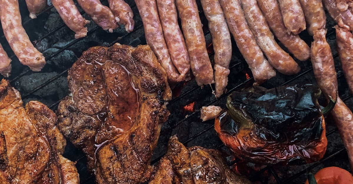 Can I bring nuts and cooked sausage from Brazil to Germany? - From above yummy steaks and meat sausages roasting on grill grid near organic capsicum during picnic Can I bring nuts and cooked sausage from Brazil to Germany? - From above yummy steaks and meat sausages roasting on grill grid near organic capsicum during picnic