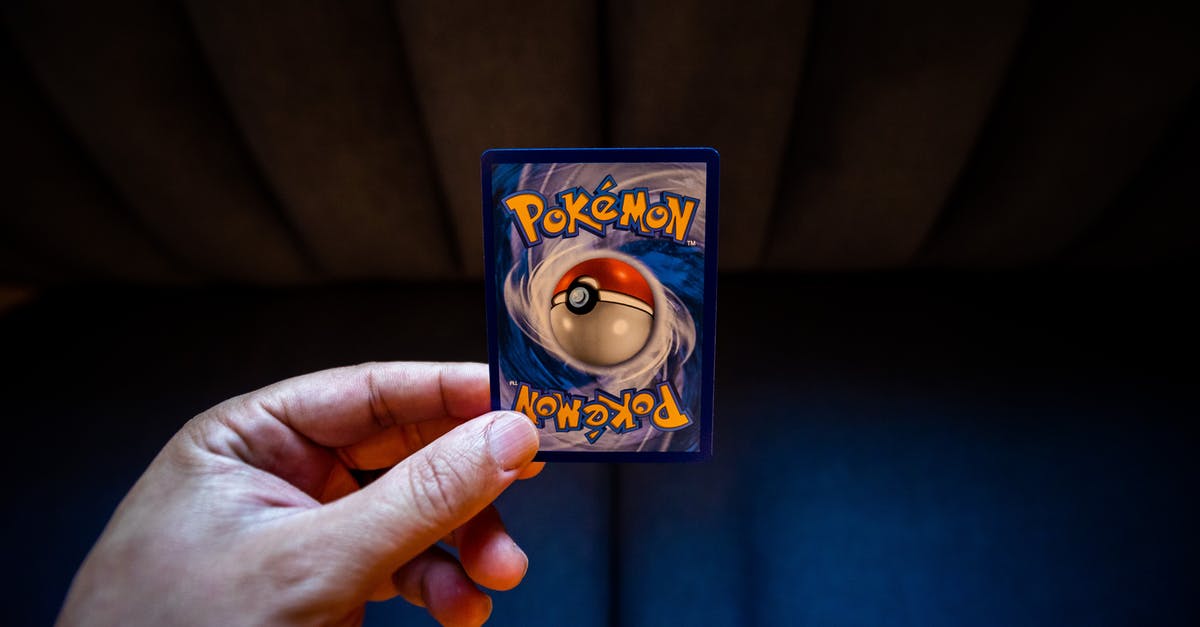 Can I buy a Graphics card in the US and bring it back to EU? - Crop person holding colorful trading card Can I buy a Graphics card in the US and bring it back to EU? - Crop person holding colorful trading card